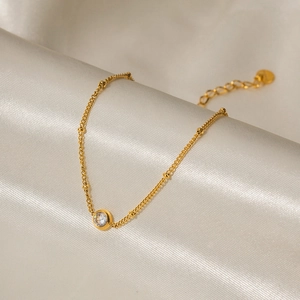 Bracciale in acciaio inossidabile placcato oro 16K con zircone bianco su seta