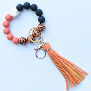 Colorful leopard print silicone beaded keychain bracelet with wood bead and PU tassel