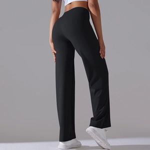 Detail view of high-waisted wide-leg yoga pants showing the slimming fit and pocket design