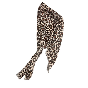 Detail view of leopard print headband showing light fabric and reinforced edge stitching