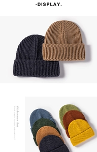 Multi-color display of thick knit fisherman hats with textured fold-over brim details