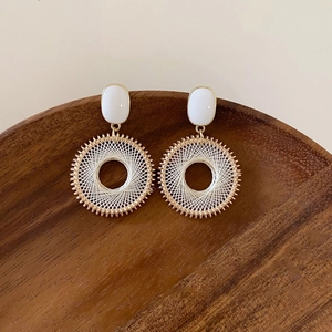 Bohemian geometric round hoop earrings with grid pattern in white and gold finish