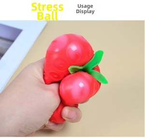 Macro shot of realistic strawberry squishy toy showing texture and soft deformation