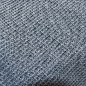 Close-up detail of the breathable waffle knit fabric in a modern grey-blue shade