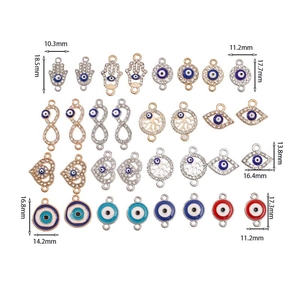 Turkish evil eye and heart charms in gold and silver finish with dimension markings