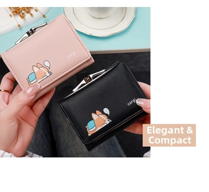Close-up of trifold wallet with cute corgi print and metal kiss-lock closure detail