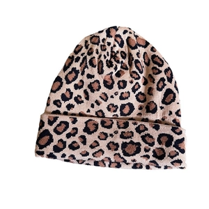 Women's leopard print jacquard knit beanie with thick fold-over cuff for winter warmth