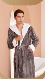Detail of dark gray flannel hooded robe with white plush lining and textured stripes