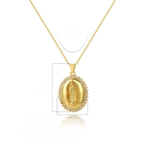 Detailed macro view of 18k gold plated Virgin Mary pendant with cubic zirconia inlay