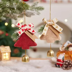 Felt and plush Christmas tree ornaments with bells and bows for festive decor