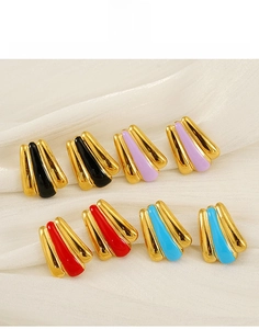 Detail view of 18k gold plated fan-shaped titanium earrings in four enamel colors
