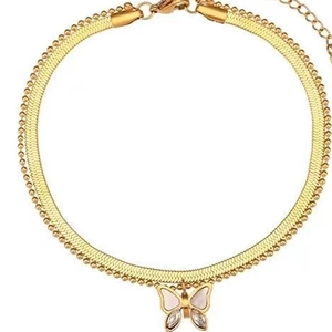 Double-layer gold butterfly anklet featuring white shell inlay and sparkling crystals