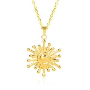 Macro view of 18k gold plated stainless steel sun pendant with fine metal chain necklace