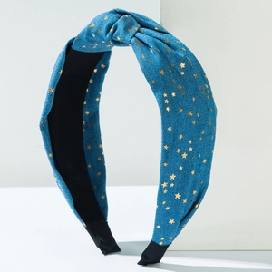 Blue denim headband with gold star patterns and a stylish top knot design