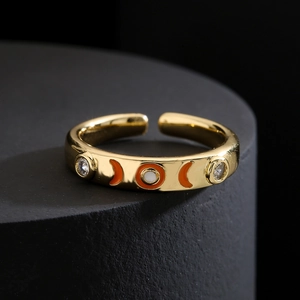 Adjustable 18K gold plated copper ring with orange enamel moon and zircon accents