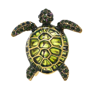Vintage gold sea turtle brooch with green enamel shell and sparkling rhinestones