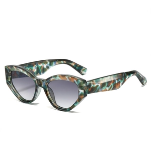 Classic cat eye sunglasses with camouflage frame and gradient grey lenses for women