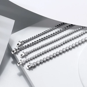 Five S925 sterling silver tennis bracelets with black and white zircon stones in various sizes