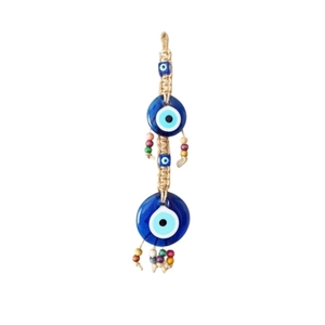 Handmade evil eye wall hanging with blue glass beads and colorful wooden beads on rope