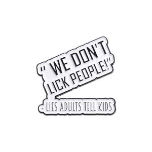 Funny enamel pin with slogan WE DON'T LICK PEOPLE on white background for clothing