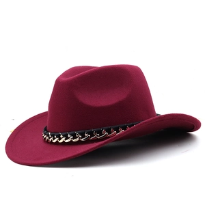 Detail shot of the burgundy wool fedora hat featuring a stylish black and gold chain band