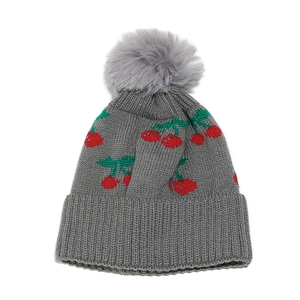 Detailed knit pattern on gray winter beanie with red cherry embroidery and faux fur pom