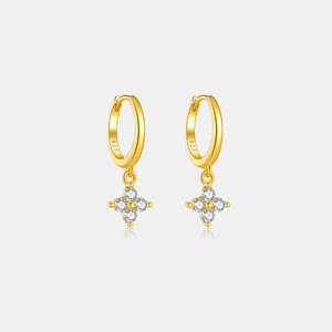 Close-up of S925 sterling silver gold plated hoop earring with zircon flower pendant
