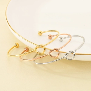 Minimalist knot C-shaped open bracelet set in gold, rose gold and silver stainless steel