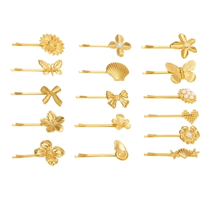 14-piece set of gold butterfly and shell hair clips in various elegant metal designs