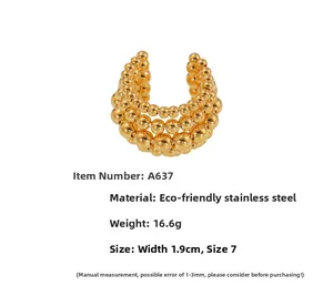 Detailed close-up of a three-layer gold beaded stainless steel wide ring with smooth finish