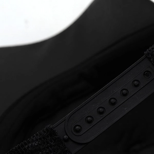 Detail of adjustable snapback plastic closure on a black sequin baseball cap