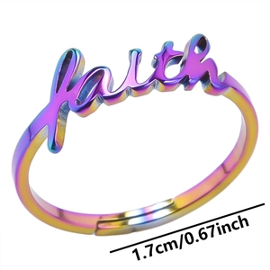 Macro detail of rainbow stainless steel adjustable ring featuring cursive faith design