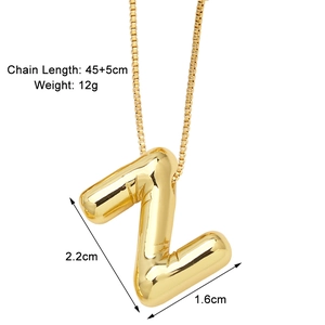 Detail view of gold letter Z pendant with dimensions 2.2x1.6cm and 45+5cm chain length
