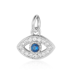 Macro detail of silver evil eye pendant with blue gemstone and sparkling zirconia stones