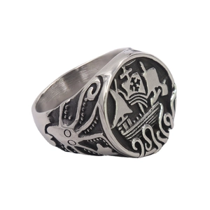Vintage stainless steel mens ring featuring embossed pirate ship and octopus kraken design