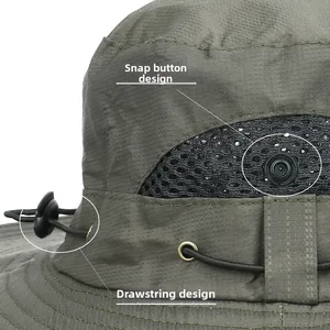 Detail of dark green sun hat featuring breathable mesh, metal snap button and drawstring
