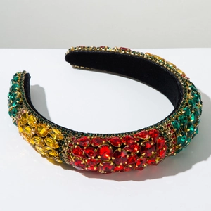 Macro view of baroque sponge headband featuring colorful crystals and golden rhinestones