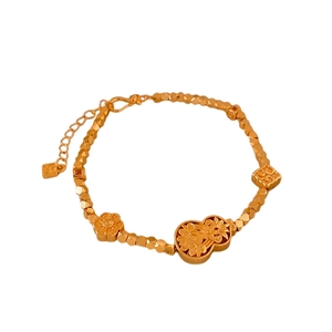 Gold plated hollow gourd and flower bead bracelet in elegant New Chinese style jewelry