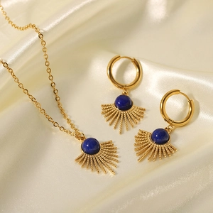 Vintage gold sunflower jewelry set with blue lapis lazuli necklace and earrings