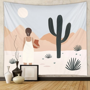 Detail of bohemian tapestry featuring minimalist desert cactus landscape on a wall