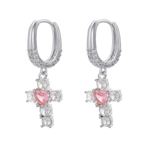 Close-up of silver cross earrings featuring pink heart stones and white cubic zirconia
