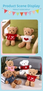 Close-up of cute teddy bears wearing I Love You sweaters for Valentine gift