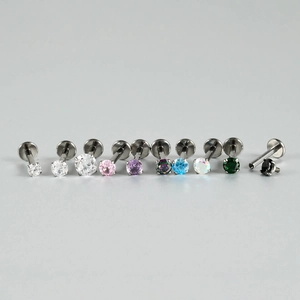 G23 titanium labret studs set featuring multi-colored cubic zirconia in a row