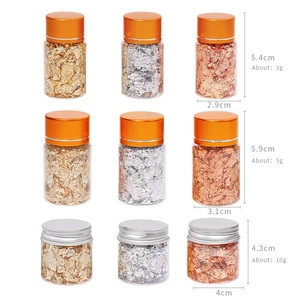 Mixed gold, silver, and copper foil flakes for DIY nail art and painting in jars