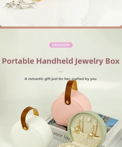 Close-up of portable PU leather jewelry box with necklace hooks and velvet lining
