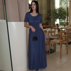 Detailed close-up of dark blue slim fit maxi dress with elegant short sleeves and U-neck