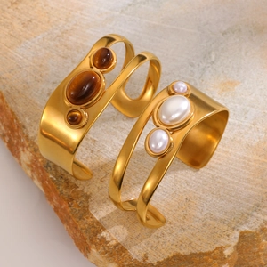 Golden hollow oval tiger eye and pearl stainless steel open cuff bracelets