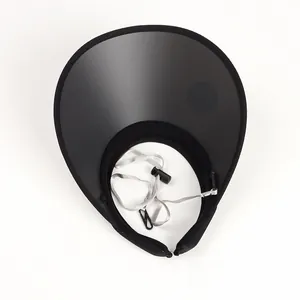 Detail of black wide-brim sun visor with adjustable grey windproof chin strap