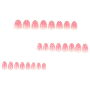 Short round pink gradient press-on nails with white polka dots set of 24 pieces