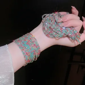 Sparkling multi-layer elastic bracelet with colorful rhinestones in blue and pink tones